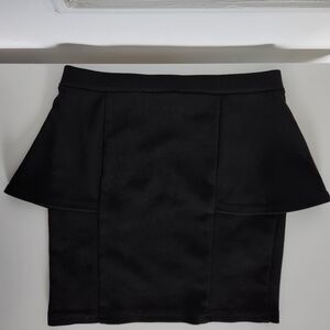 LIMITÉ Black peplum skirt